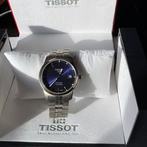 TISSOT Watch TITANIUM. Blue Face